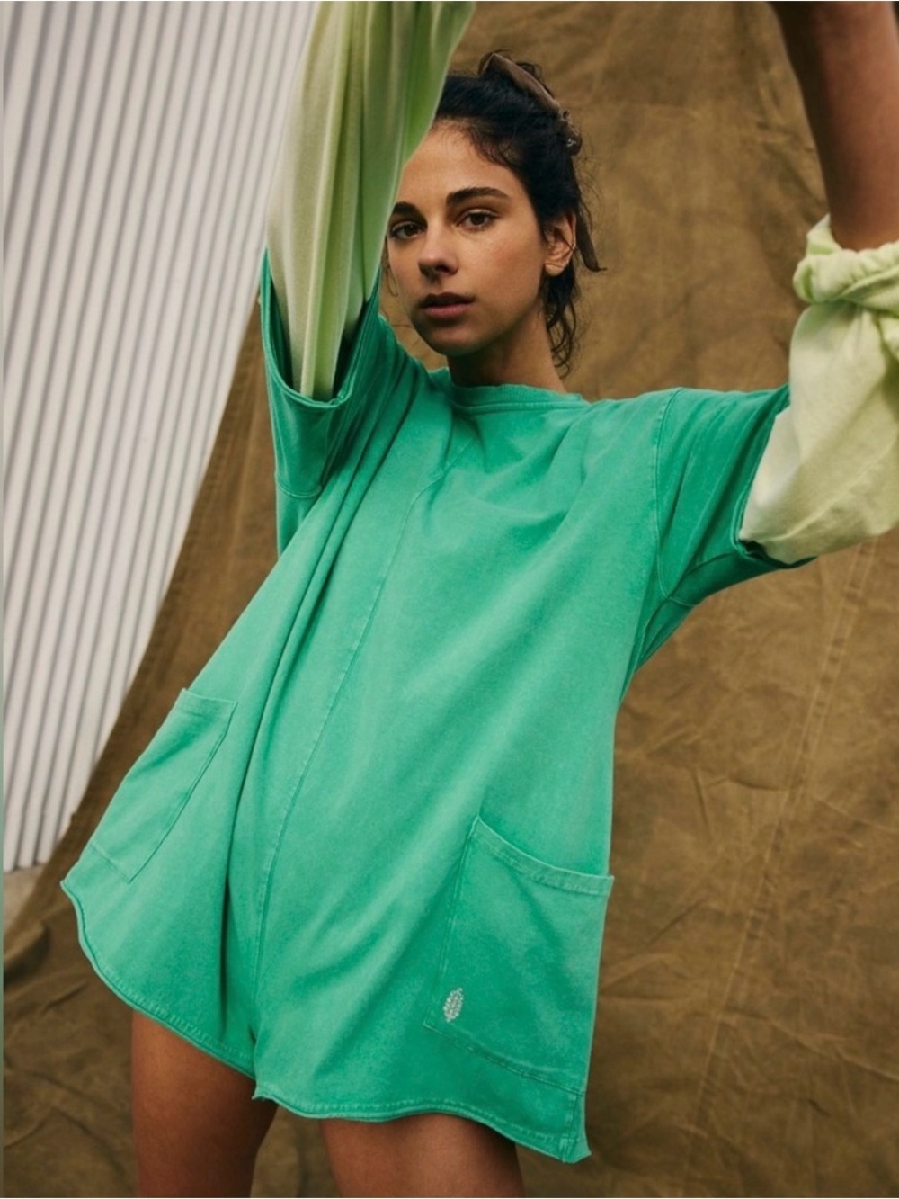 Free People Movement romper tee in green sheen.
